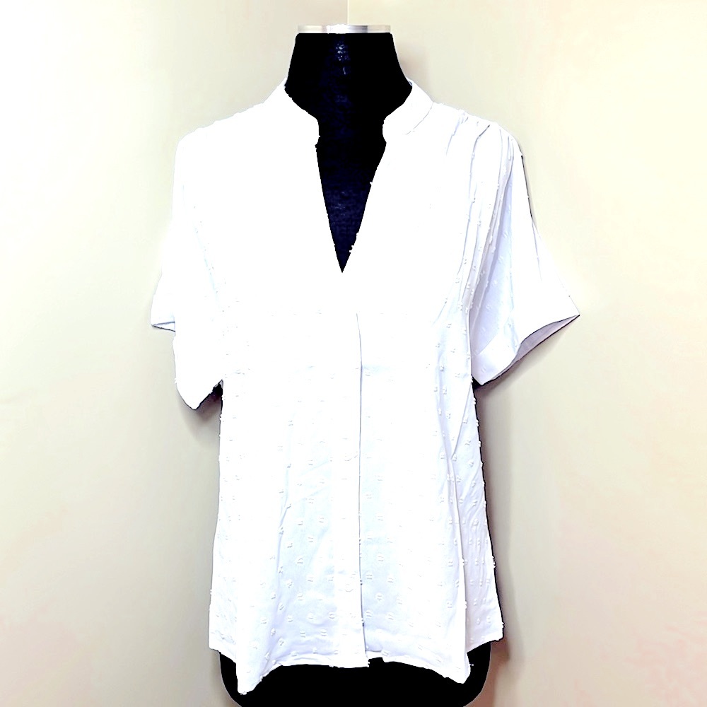 NWT white blouse with cute raised dot detail.  V-neck medium❣️